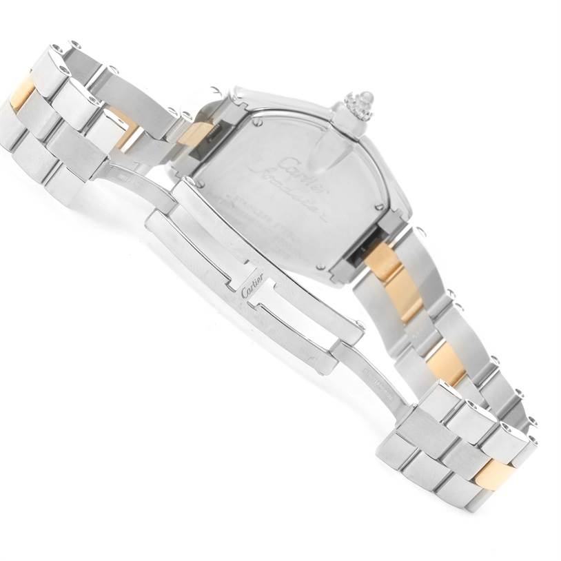 The image shows the back view of a Roadster model by Cartier, highlighting the clasp, case, and two-tone bracelet.