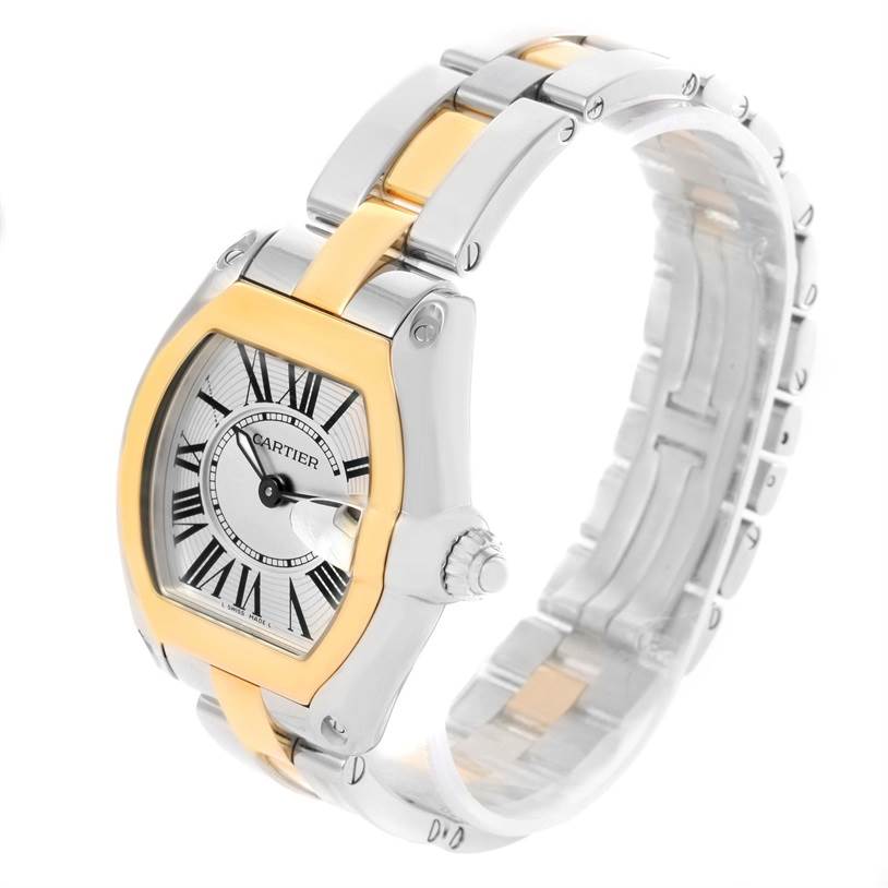 This image shows a Cartier Roadster W62026Y4 Men's Steel and Gold (two tone) Silver Dial W62026Y4 Men's Steel and Gold (two tone) Silver Dial watch at a three-quarter angle, highlighting its face, bezel, and stainless steel and gold bracelet.