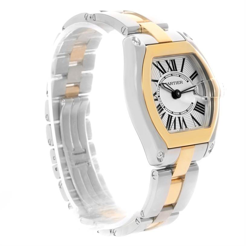 This Cartier Roadster W62026Y4 Men's Steel and Gold (two tone) Silver Dial W62026Y4 Men's Steel and Gold (two tone) Silver Dial watch is shown at a 3/4 angle, highlighting the face, bracelet, and the side.