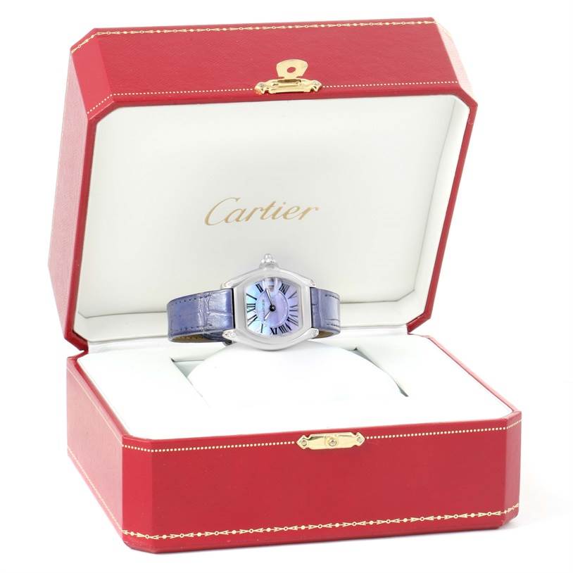 The Cartier Roadster W6206007 Stainless Steel Mother of Pearl Dial W6206007 Stainless Steel Mother of Pearl Dial watch is showcased inside an open red Cartier box, seen from the front.