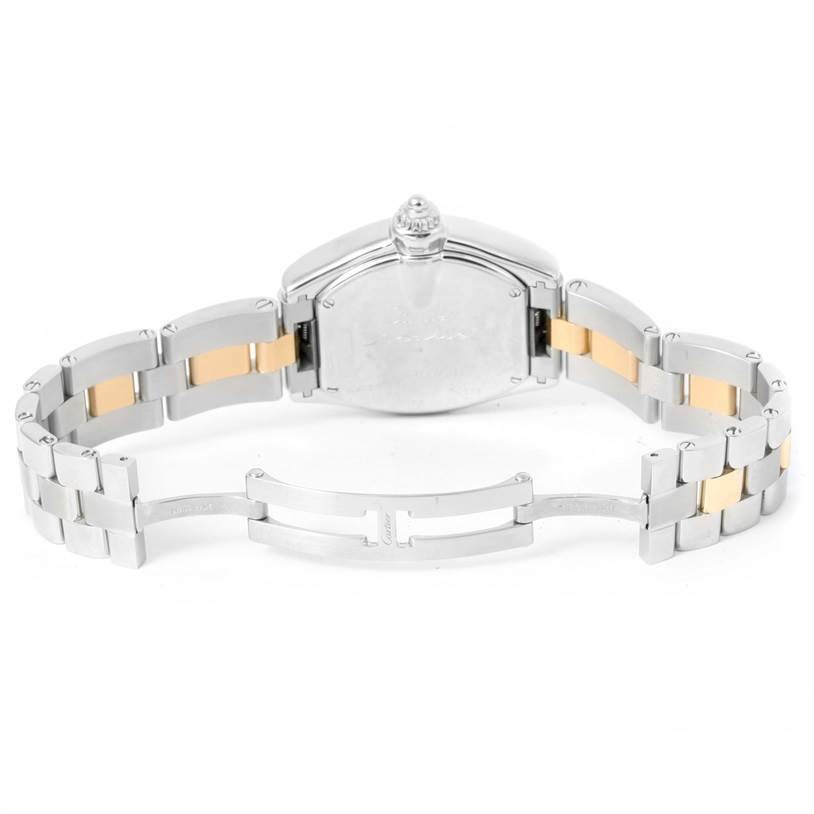The image shows the back view of a Cartier Roadster W62026Y4 Women's Steel and Gold (two tone) Silver Dial W62026Y4 Women's Steel and Gold (two tone) Silver Dial watch with its metal bracelet partially open.