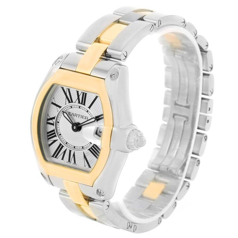 This image shows a Cartier Roadster W62026Y4 Women's Steel and Gold (two tone) Silver Dial W62026Y4 Women's Steel and Gold (two tone) Silver Dial watch from a three-quarter angle, highlighting its face, crown, and bracelet.