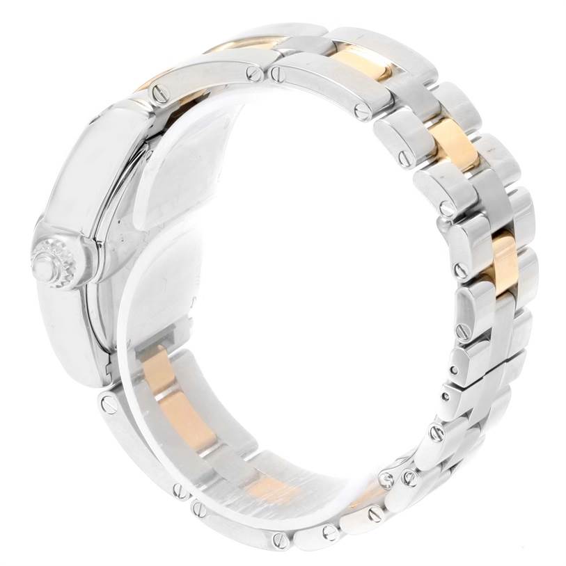 This image shows a side angle of the Cartier Roadster W62026Y4 Women's Steel and Gold (two tone) Silver Dial W62026Y4 Women's Steel and Gold (two tone) Silver Dial watch, highlighting the crown and the two-tone strap.