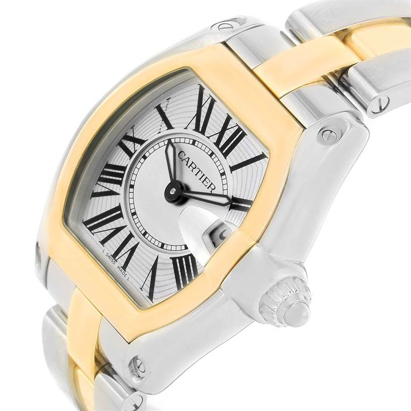 This image shows a close-up of the dial, bezel, crown, and part of the bracelet of a Cartier Roadster W62026Y4 Women's Steel and Gold (two tone) Silver Dial W62026Y4 Women's Steel and Gold (two tone) Silver Dial watch.