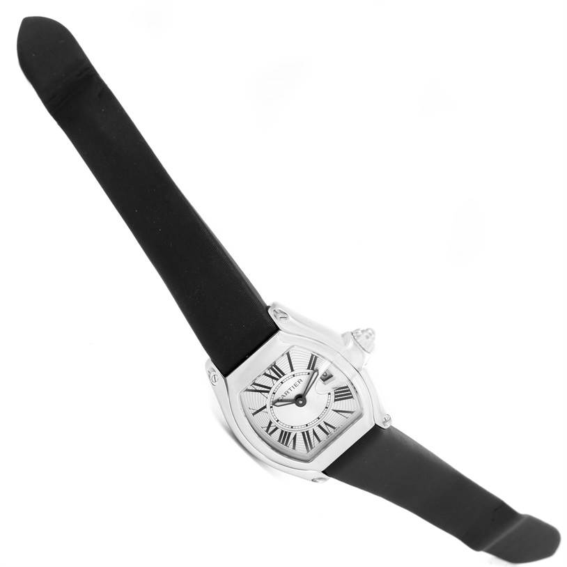 The Cartier Roadster W62016V3 Women
s Stainless Steel Silver Dial W62016V3 Women
s Stainless Steel Silver Dial watch is shown at a slight diagonal angle, displaying the face and full leather strap.