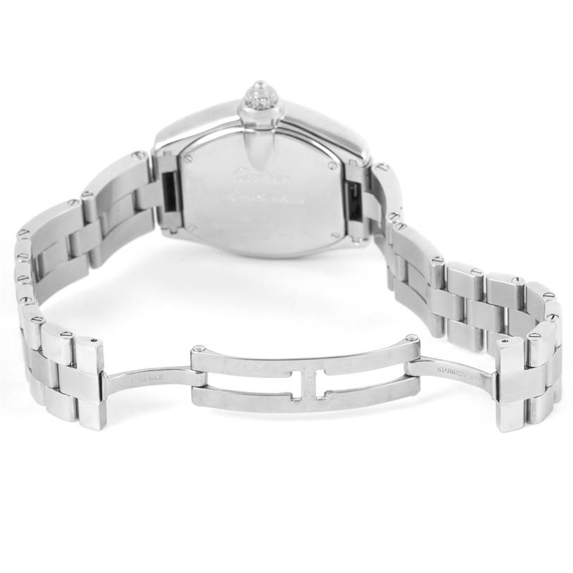 The image shows the back view of the Cartier Roadster W62016V3 Women
s Stainless Steel Silver Dial W62016V3 Women
s Stainless Steel Silver Dial watch, featuring the case back and partially open metal bracelet.