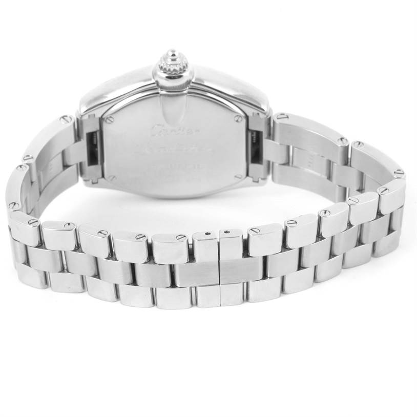The image shows the back view of a Cartier Roadster W62016V3 Women
s Stainless Steel Silver Dial W62016V3 Women
s Stainless Steel Silver Dial watch, focusing on the case back and metal bracelet.