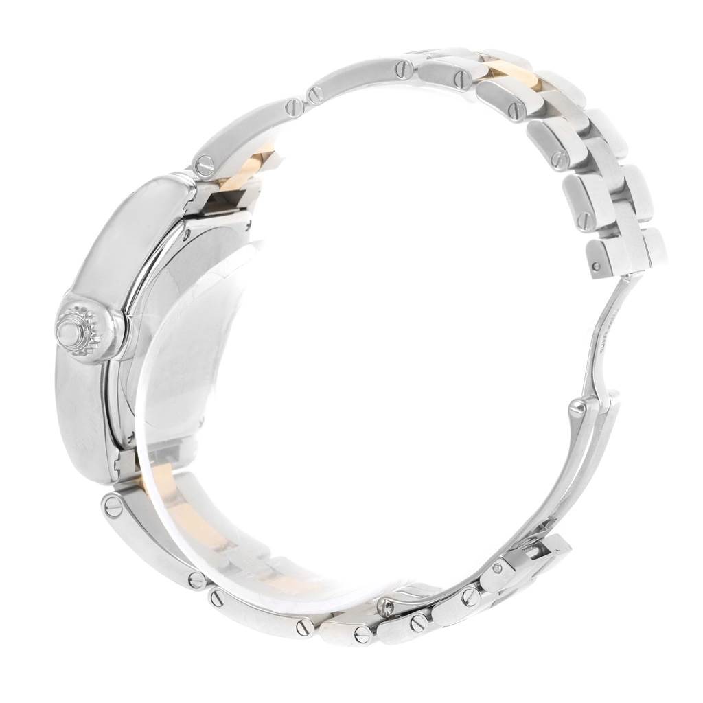 The image shows the side view of a Cartier Roadster W62026Y4 Women's Steel and Gold (two tone) Silver Dial W62026Y4 Women's Steel and Gold (two tone) Silver Dial watch, highlighting the crown, casing, and bracelet.