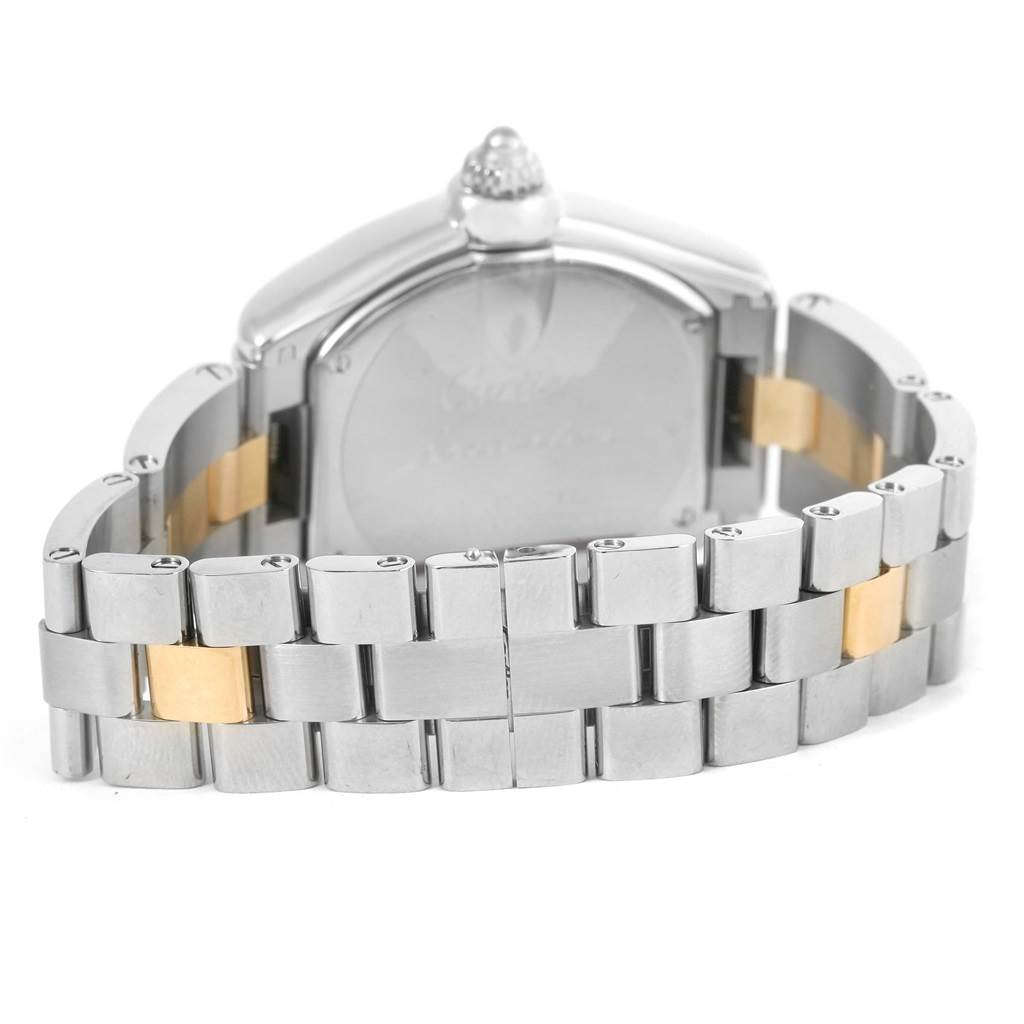The image shows the back case and bracelet of a Cartier Roadster W62026Y4 Women's Steel and Gold (two tone) Silver Dial W62026Y4 Women's Steel and Gold (two tone) Silver Dial watch, featuring a two-tone metal design.