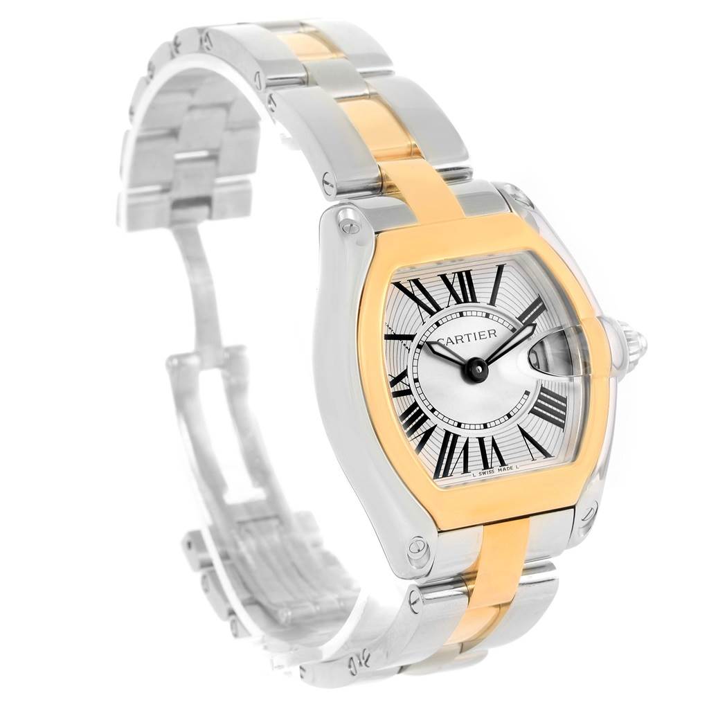 The image shows a Cartier Roadster W62026Y4 Women's Steel and Gold (two tone) Silver Dial W62026Y4 Women's Steel and Gold (two tone) Silver Dial watch from a front-side angle, highlighting its face, bezel, and part of the bracelet.