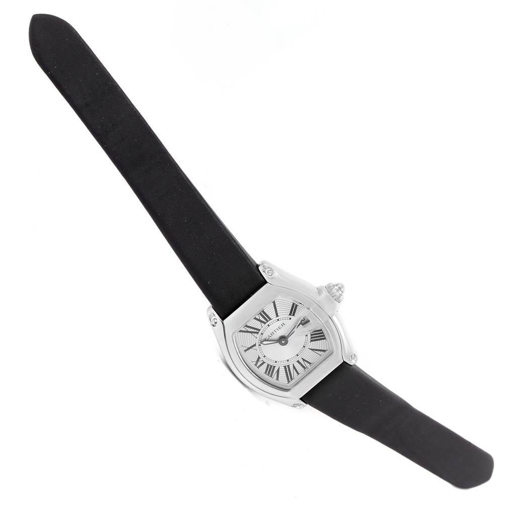 The Cartier Roadster W62016V3 Women
s Stainless Steel Silver Dial W62016V3 Women
s Stainless Steel Silver Dial watch is shown from a top-down angle, displaying its face, case, and both straps.