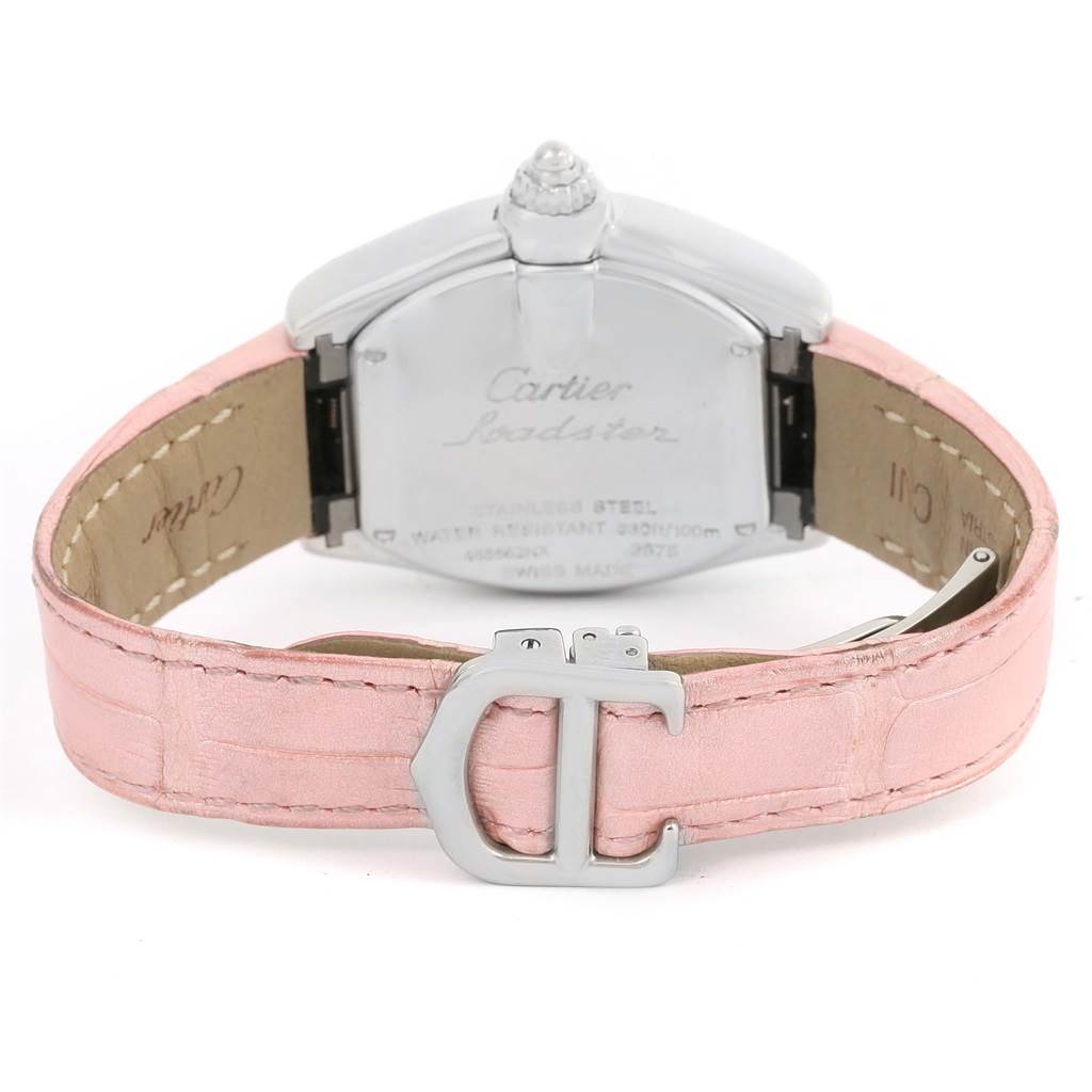 This image shows the back view of a Cartier Roadster W6206006 Women's Stainless Steel Mother of Pearl Dial W6206006 Women's Stainless Steel Mother of Pearl Dial watch with a pink leather strap and deployment clasp.