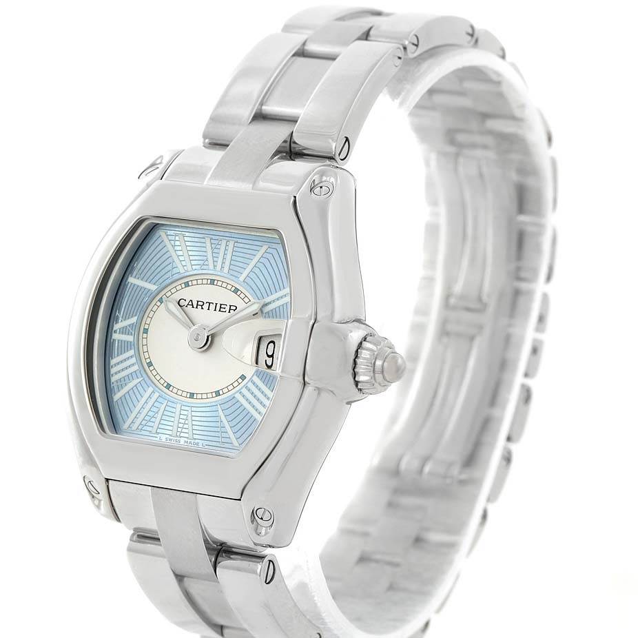 This image shows a Cartier Roadster W62053V3 Women's Stainless Steel Blue Dial W62053V3 Women's Stainless Steel Blue Dial watch from a front-side angle, highlighting its dial, case, and bracelet.