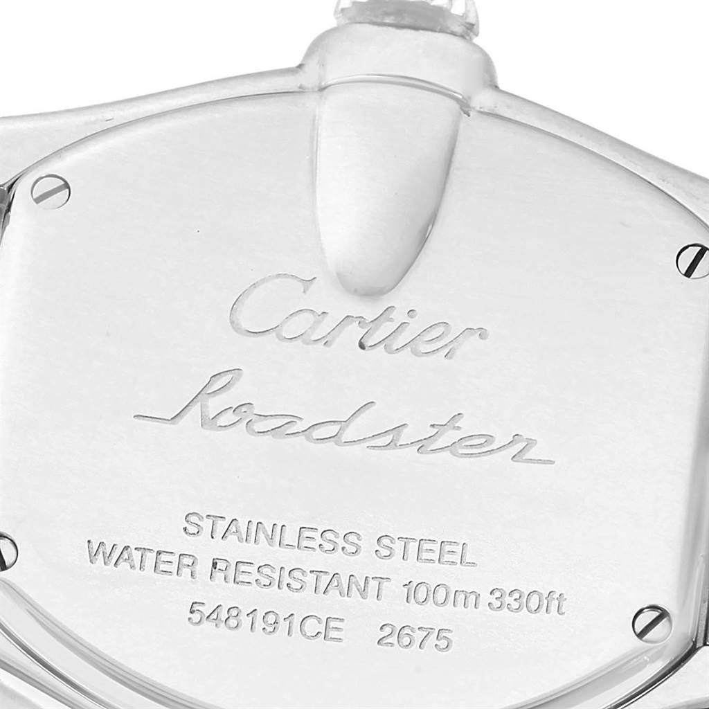 The image shows the back casing of a Cartier Roadster W62016V3 Women
s Stainless Steel Silver Dial W62016V3 Women
s Stainless Steel Silver Dial watch made of stainless steel, featuring its model and specifications.