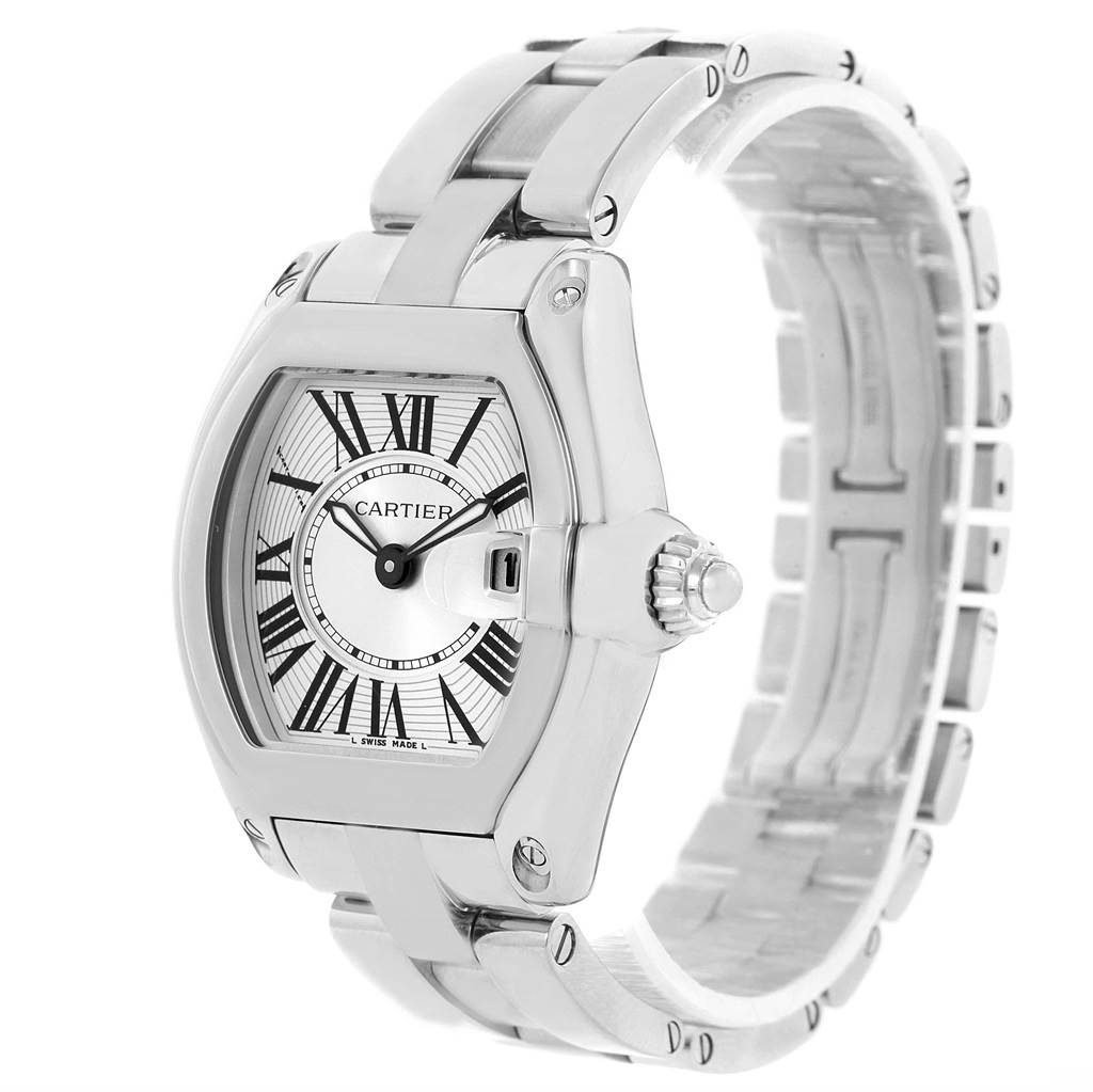 The Cartier Roadster W62016V3 Women
s Stainless Steel Silver Dial W62016V3 Women
s Stainless Steel Silver Dial watch is shown from an oblique angle, highlighting its face, dial, bracelet, and crown.