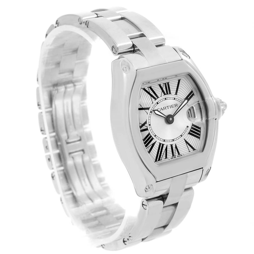 The image shows a Cartier Roadster W62016V3 Women
s Stainless Steel Silver Dial W62016V3 Women
s Stainless Steel Silver Dial watch at a three-quarter angle, highlighting its face and bracelet.