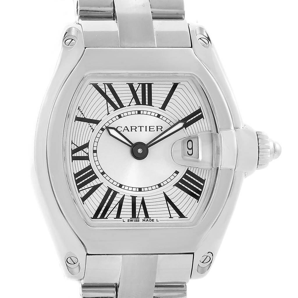 The image shows a close-up front angle of the Cartier Roadster W62016V3 Women
s Stainless Steel Silver Dial W62016V3 Women
s Stainless Steel Silver Dial watch, highlighting the face, Roman numerals, and date window.
