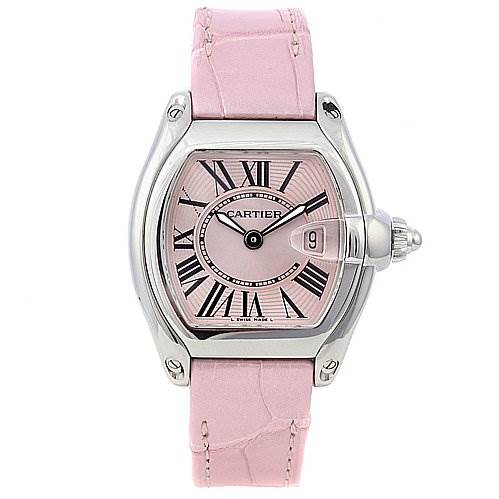 The image shows a front view of a Cartier Roadster W62017V3 Women
s Stainless Steel Pink Dial W62017V3 Women
s Stainless Steel Pink Dial watch with a pink dial and matching pink strap.