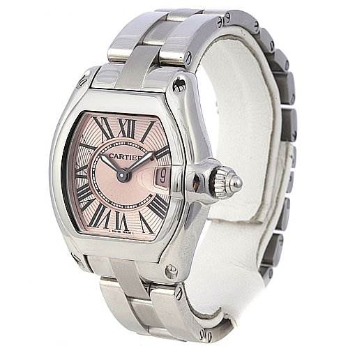The Cartier Roadster W62017V3 Women
s Stainless Steel Pink Dial W62017V3 Women
s Stainless Steel Pink Dial watch is shown at an angle displaying the face, bezel, crown, and part of the bracelet.