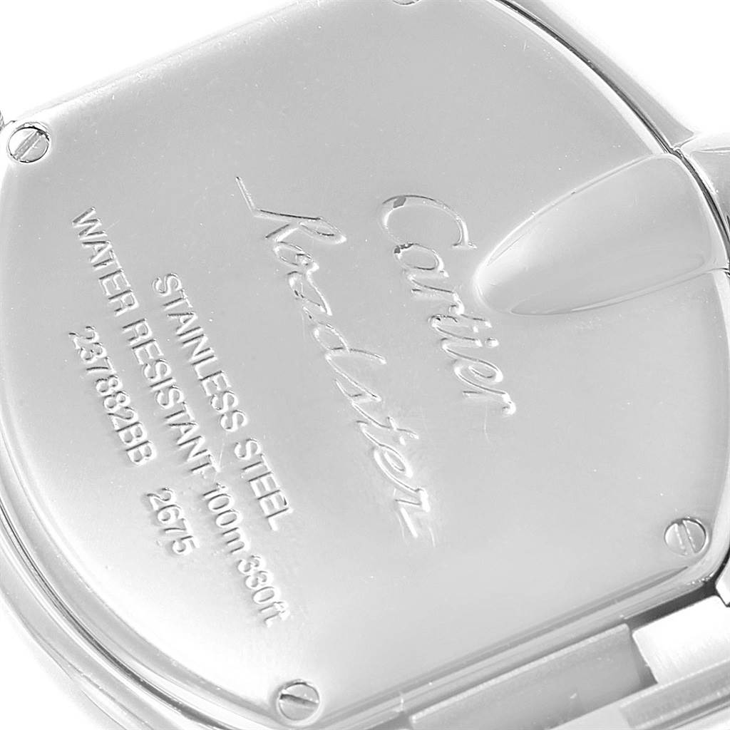 The image shows the back case of a Cartier Roadster W62016V3 Women
s Stainless Steel Silver Dial W62016V3 Women
s Stainless Steel Silver Dial watch, highlighting the brand and model engravings.