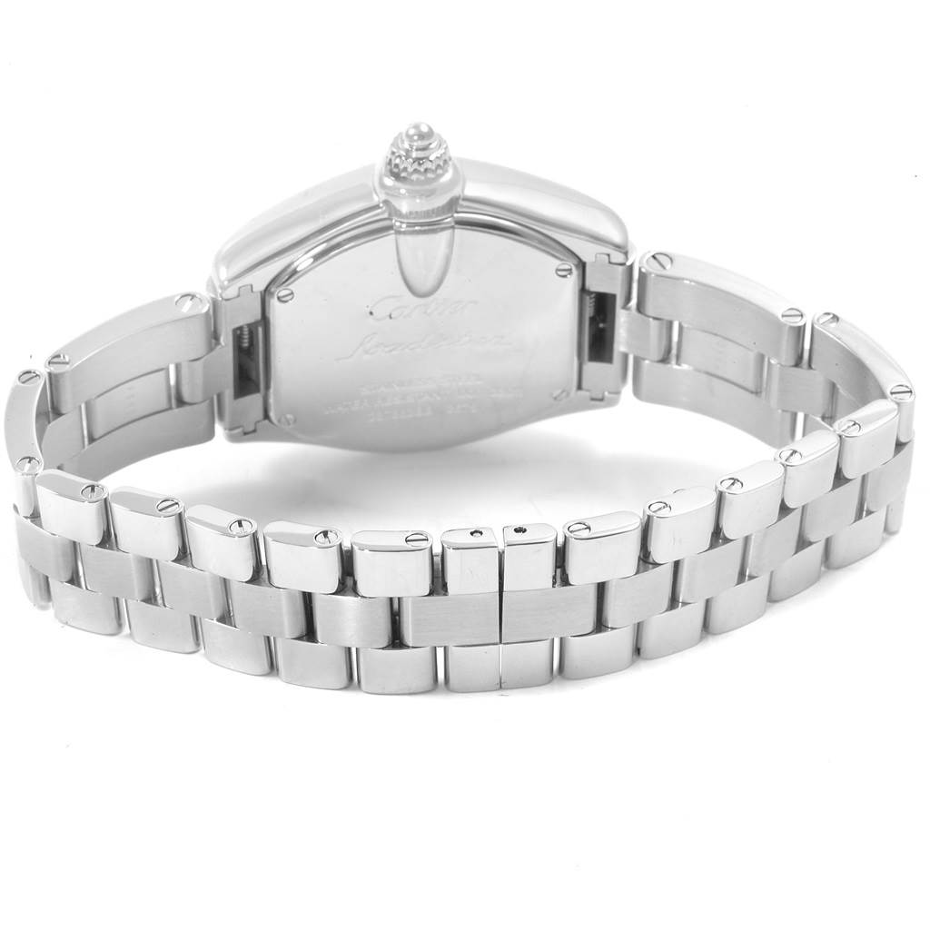 The image shows the back view of a Cartier Roadster W62016V3 Women
s Stainless Steel Silver Dial W62016V3 Women
s Stainless Steel Silver Dial watch, focusing on the caseback and metal bracelet.