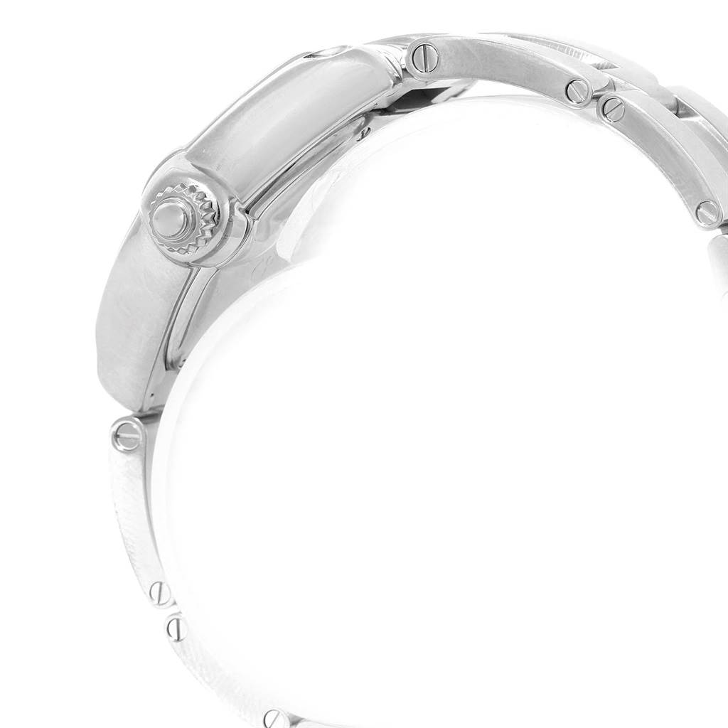 This image shows a side view of the case and crown of a Roadster model watch by Cartier.