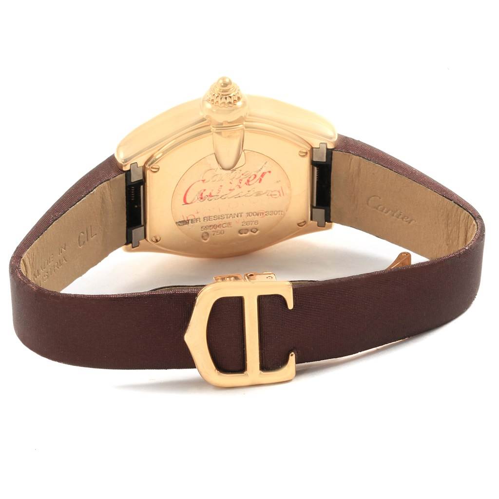 The image shows the back case and brown leather strap of a Cartier Roadster W62018Y5 Women's Yellow Gold Silver Dial W62018Y5 Women's Yellow Gold Silver Dial watch.