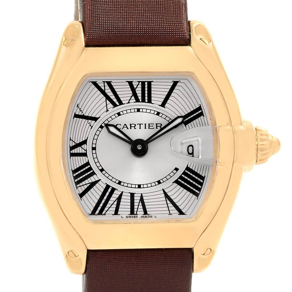 The image shows a Cartier Roadster W62018Y5 Women's Yellow Gold Silver Dial W62018Y5 Women's Yellow Gold Silver Dial watch face-on, highlighting the dial, hands, case, crown, and part of the strap.