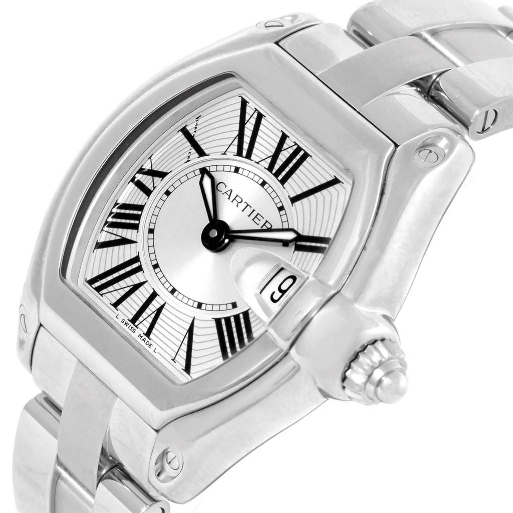 The Cartier Roadster W62016V3 Women
s Stainless Steel Silver Dial W62016V3 Women
s Stainless Steel Silver Dial watch is shown at a side angle, highlighting its face, crown, and part of the bracelet.