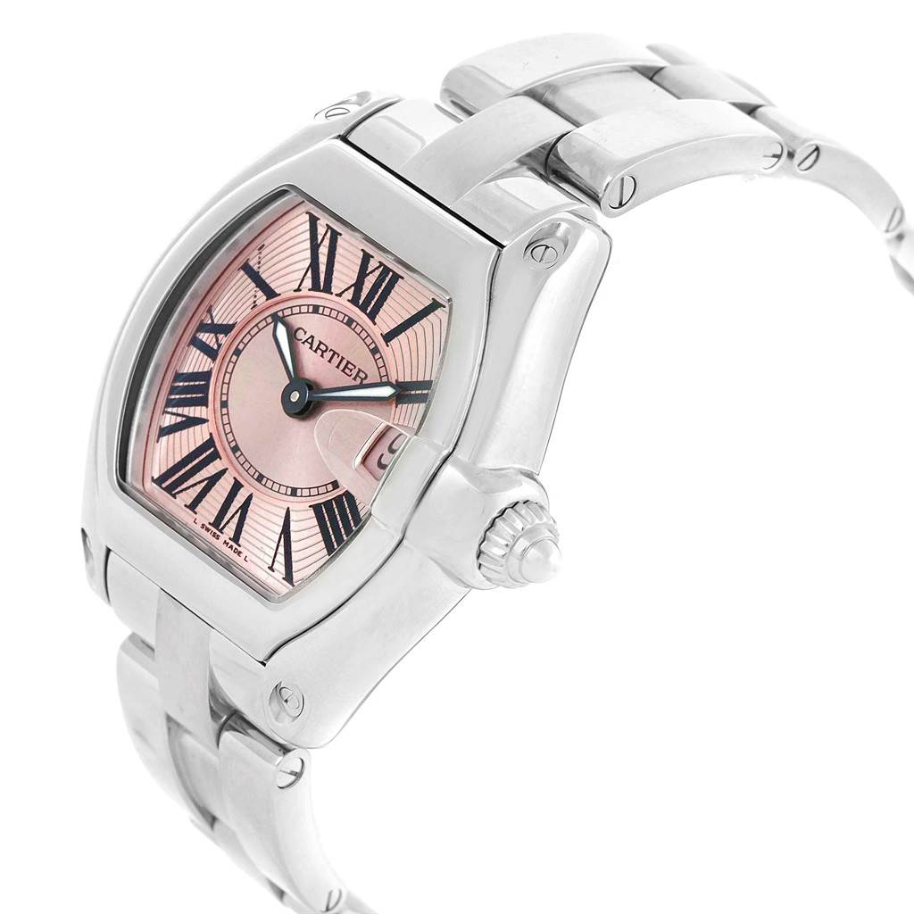 The image shows a Cartier Roadster W62017V3 Women
s Stainless Steel Pink Dial W62017V3 Women
s Stainless Steel Pink Dial watch from an angled view, highlighting the face, bezel, crown, and part of the bracelet.