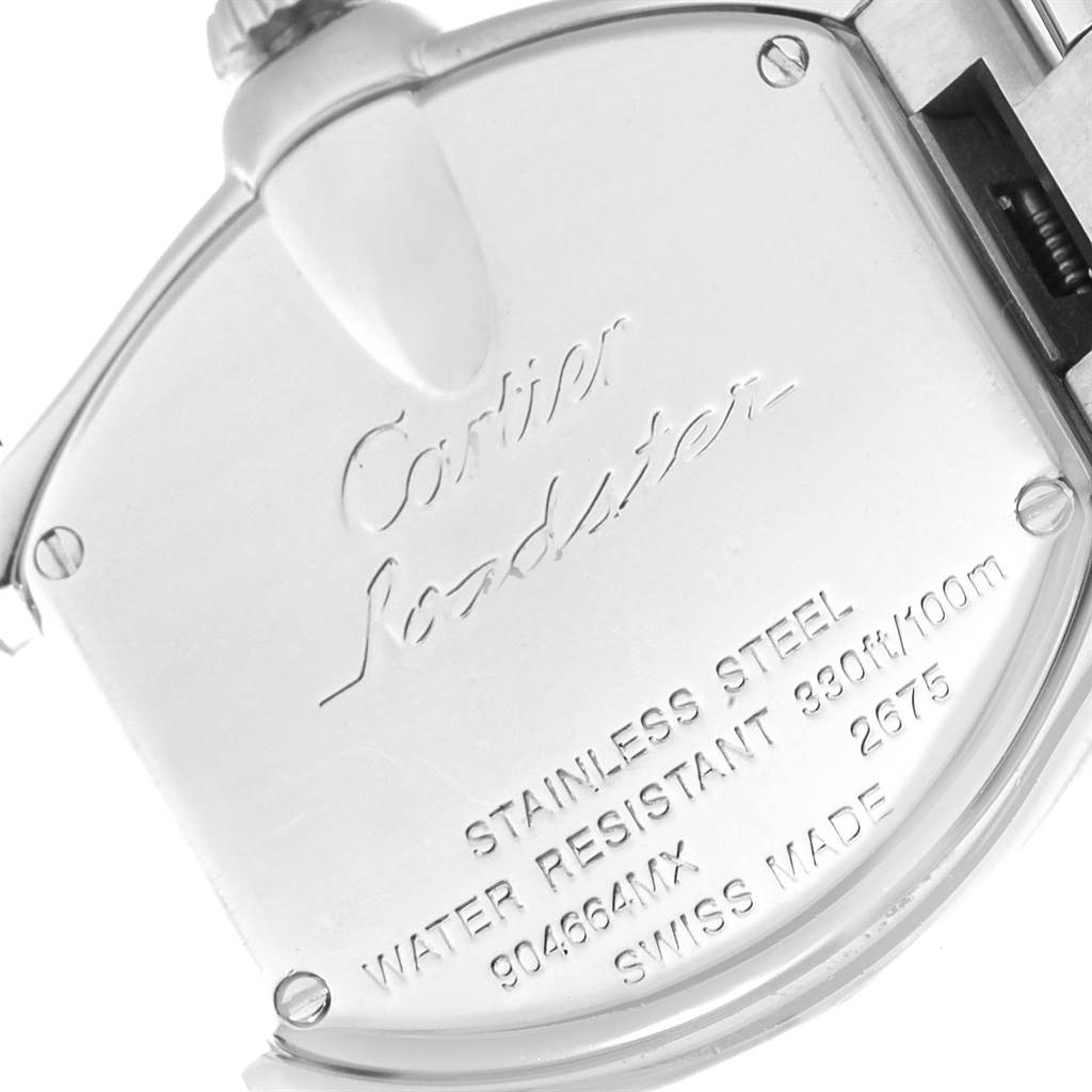 The image shows the back cover of a Cartier Roadster W62017V3 Women
s Stainless Steel Pink Dial W62017V3 Women
s Stainless Steel Pink Dial watch at an angle displaying the engravings and details.
