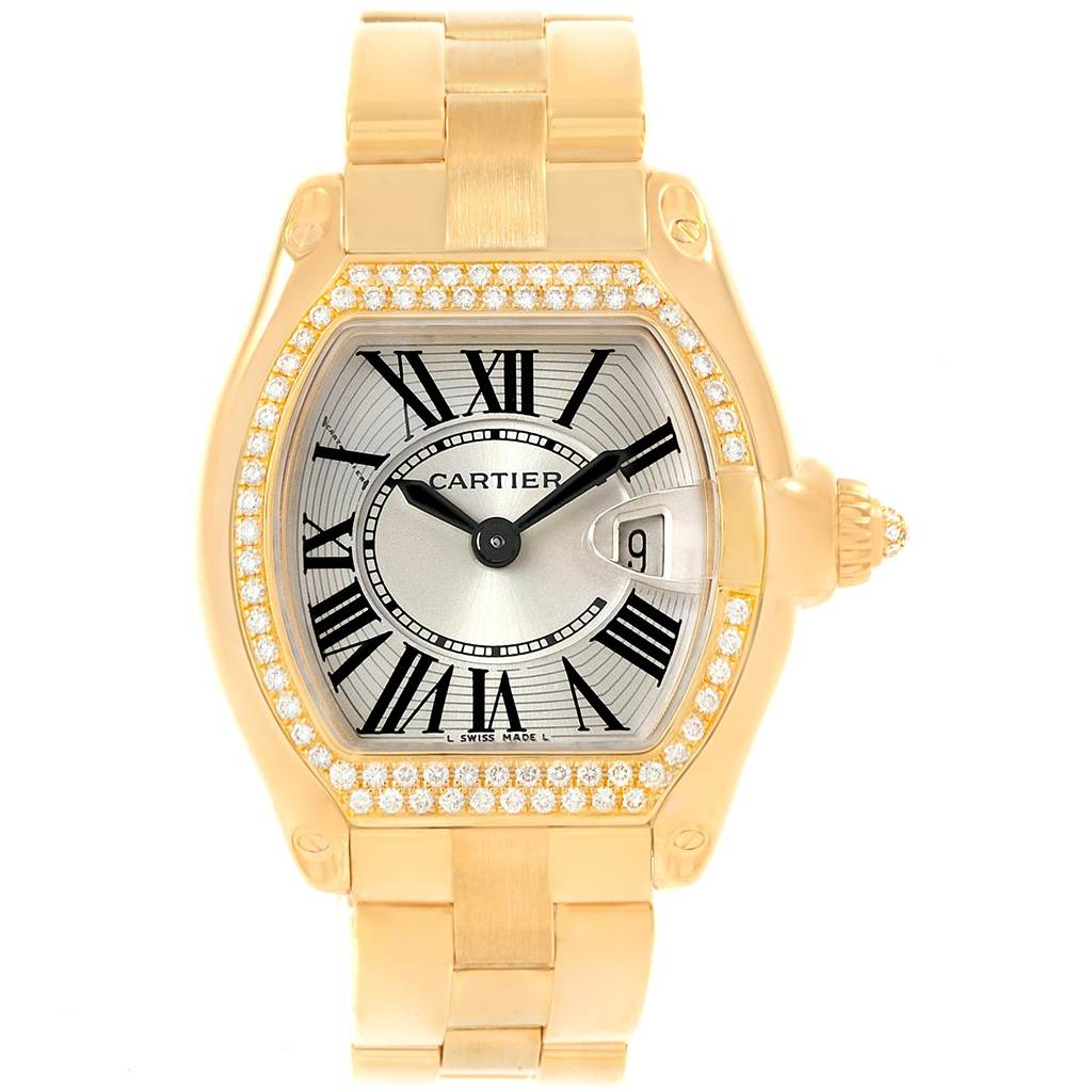 The image shows a frontal view of the Cartier Roadster WE5001X1 Women's Yellow Gold Silver Dial WE5001X1 Women's Yellow Gold Silver Dial watch, highlighting its dial, bezel, and bracelet.