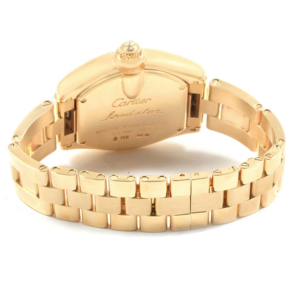 This image shows the back case and bracelet of a Cartier Roadster WE5001X1 Women's Yellow Gold Silver Dial WE5001X1 Women's Yellow Gold Silver Dial watch from a rear angle.