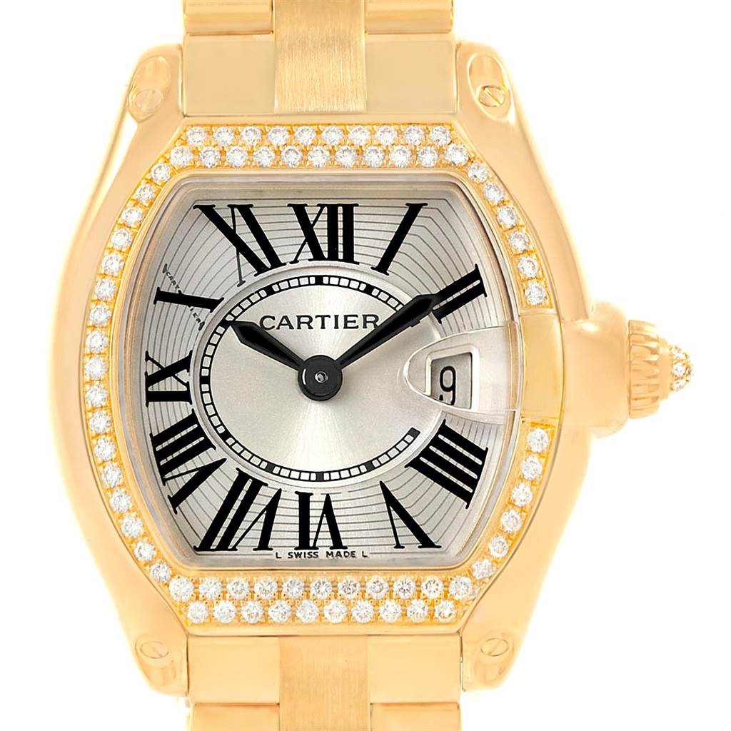 The image shows a frontal view of the Cartier Roadster WE5001X1 Women's Yellow Gold Silver Dial WE5001X1 Women's Yellow Gold Silver Dial watch, highlighting the dial, bezel, and part of the bracelet.