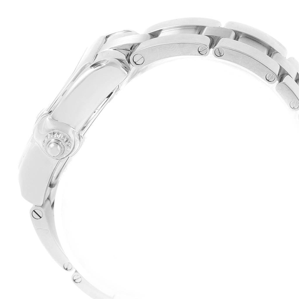 The Cartier Roadster W62017V3 Women
s Stainless Steel Pink Dial W62017V3 Women
s Stainless Steel Pink Dial watch is shown from a side angle, highlighting part of the bracelet and the winding crown.