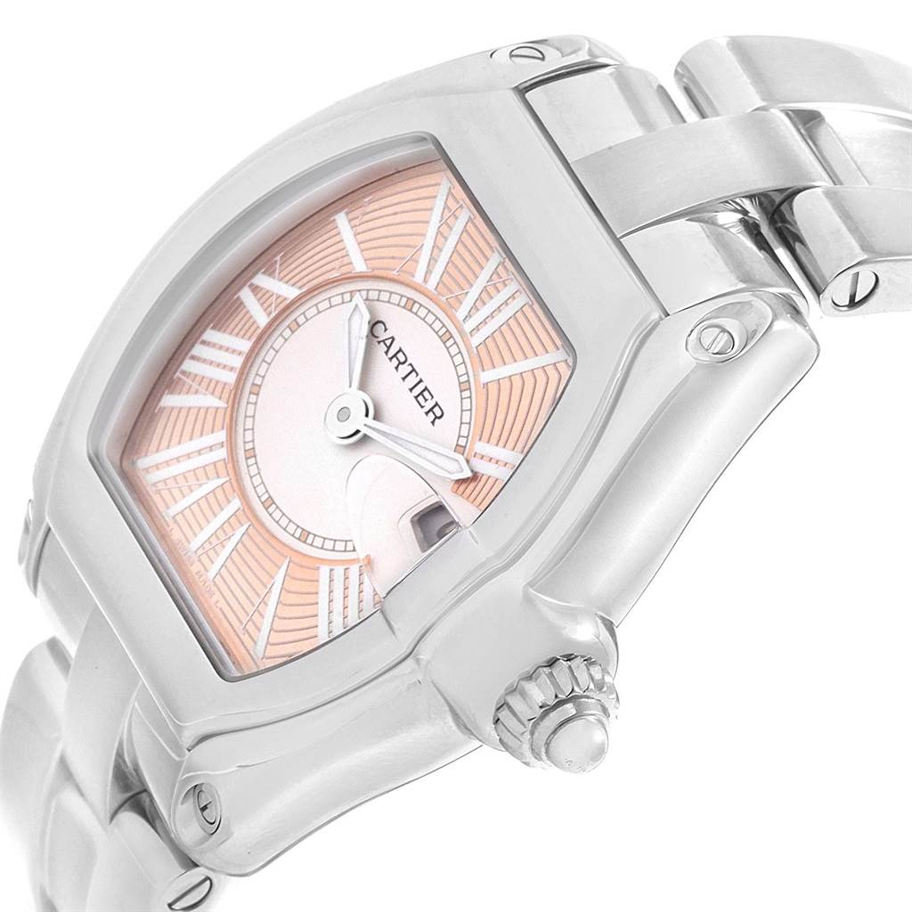 The image shows a close-up angled view of the Cartier Roadster W62054V3 Women's Stainless Steel Pink Dial W62054V3 Women's Stainless Steel Pink Dial watch, highlighting the dial, crown, and part of the bracelet.
