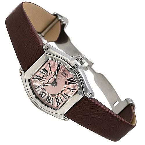 This image shows the Cartier Roadster W62017V3 Women's Stainless Steel Pink Dial W62017V3 Women's Stainless Steel Pink Dial watch at a slight angle, featuring its pink dial, Roman numerals, and leather strap.