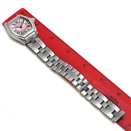 The image shows a Cartier Roadster W62017V3 Women's Stainless Steel Pink Dial W62017V3 Women's Stainless Steel Pink Dial watch laid flat next to a ruler, displaying its face, case, and full metal bracelet.