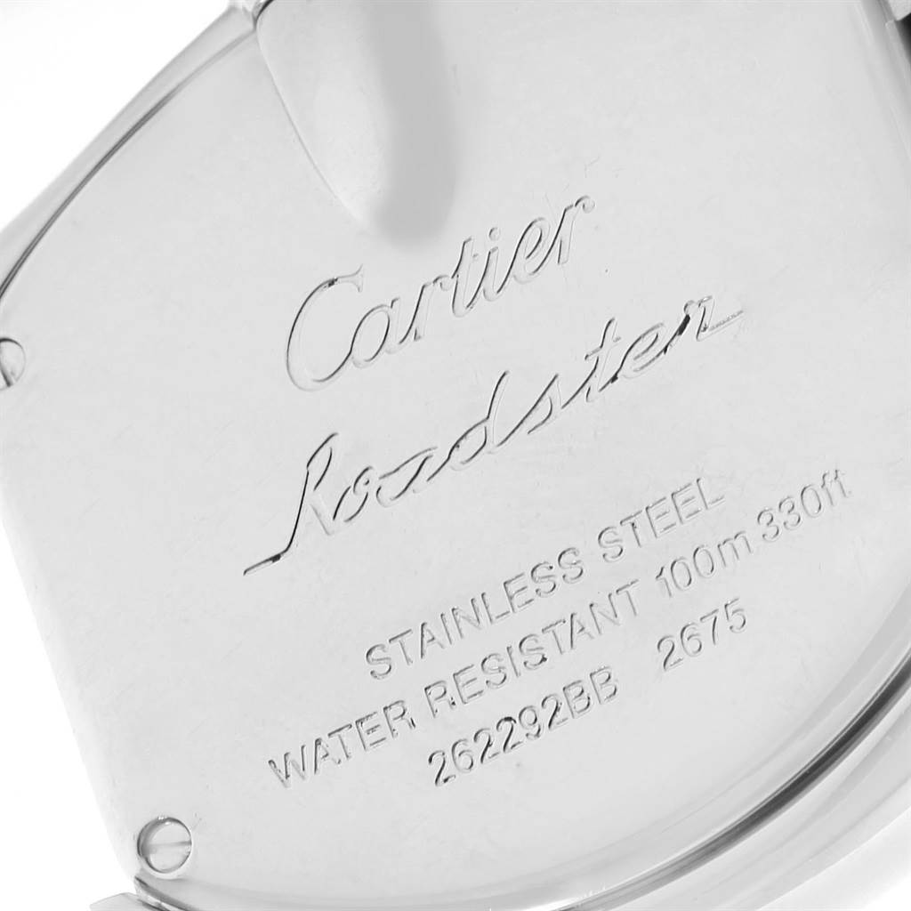 This image shows the case back of a Cartier Roadster W62016V3 Women
s Stainless Steel Silver Dial W62016V3 Women
s Stainless Steel Silver Dial watch, highlighting the engraved details.