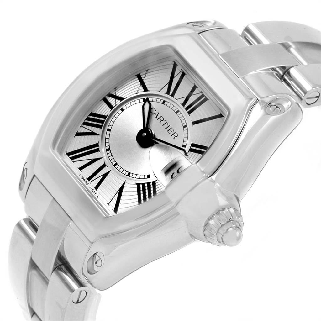 This image shows a close-up of the Cartier Roadster W62016V3 Women
s Stainless Steel Silver Dial W62016V3 Women
s Stainless Steel Silver Dial watch at an angled view, highlighting the dial, crown, and part of the bracelet.