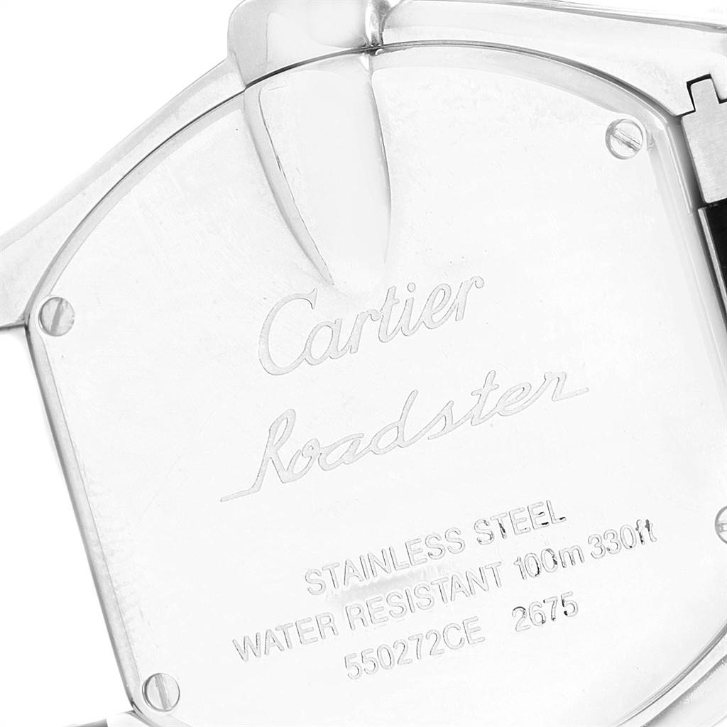 The image shows the back case of a Cartier Roadster 17859 Women
s Stainless Steel Silver Dial 17859 Women
s Stainless Steel Silver Dial watch, highlighting the engravings and screws.