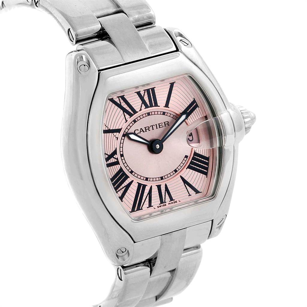 The image shows a Cartier Roadster W62017V3 Women's Stainless Steel Pink Dial W62017V3 Women's Stainless Steel Pink Dial watch angled slightly from above, highlighting its dial, case, bracelet, and crown.