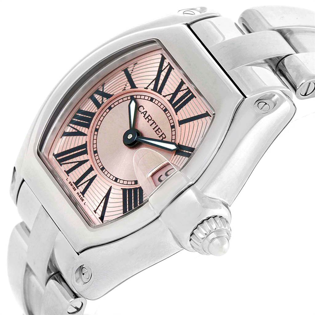 The image shows a Cartier Roadster W62017V3 Women's Stainless Steel Pink Dial W62017V3 Women's Stainless Steel Pink Dial watch, highlighting the face, bezel, crown, and part of the bracelet at an oblique angle.