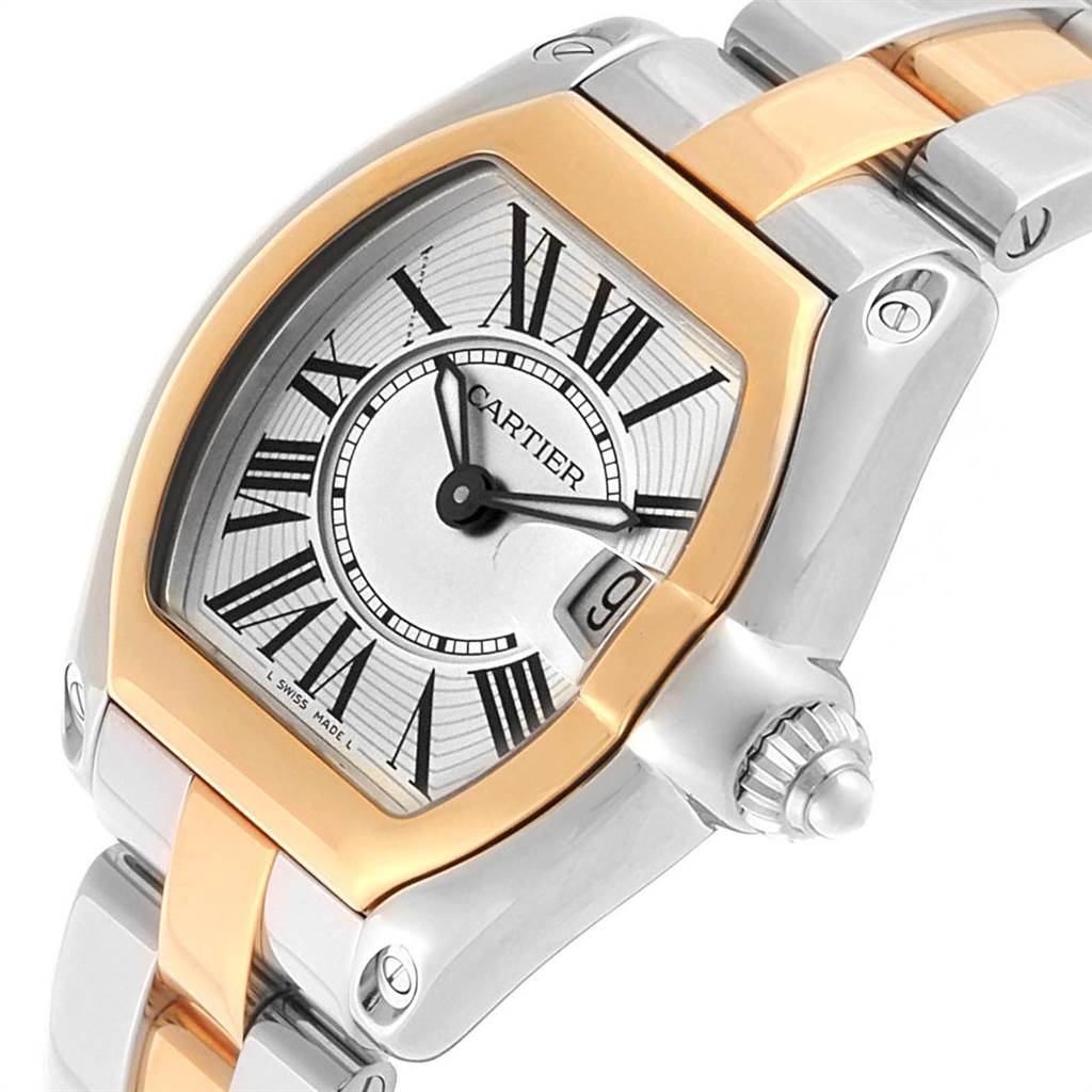 This Cartier Roadster W62026Y4 Women's Steel and Gold (two tone) Silver Dial W62026Y4 Women's Steel and Gold (two tone) Silver Dial watch is shown at an angle highlighting its face, crown, and partial bracelet.