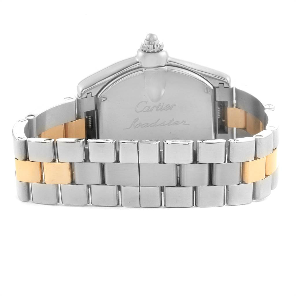 The image shows the back case and bracelet of a Cartier Roadster W62026Y4 Women's Steel and Gold (two tone) Silver Dial W62026Y4 Women's Steel and Gold (two tone) Silver Dial watch, focused on the engraved back and two-tone metal links.