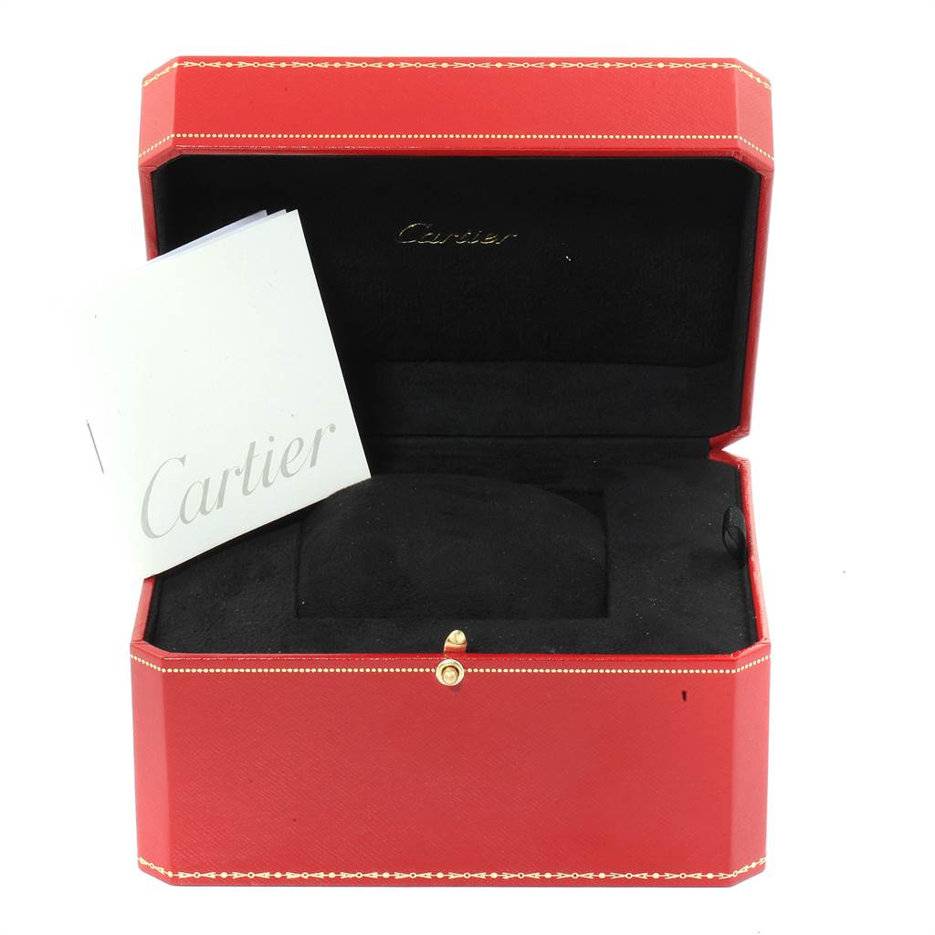 This image shows an open Cartier Roadster W62026Y4 Women's Steel and Gold (two tone) Silver Dial W62026Y4 Women's Steel and Gold (two tone) Silver Dial model watch box with a pillow and an instruction booklet inside.
