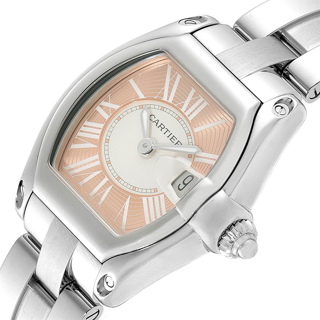The image shows a close-up angle of the Cartier Roadster W62054V3 Women's Stainless Steel Pink Dial W62054V3 Women's Stainless Steel Pink Dial watch, focusing on the dial, crown, and part of the bracelet.