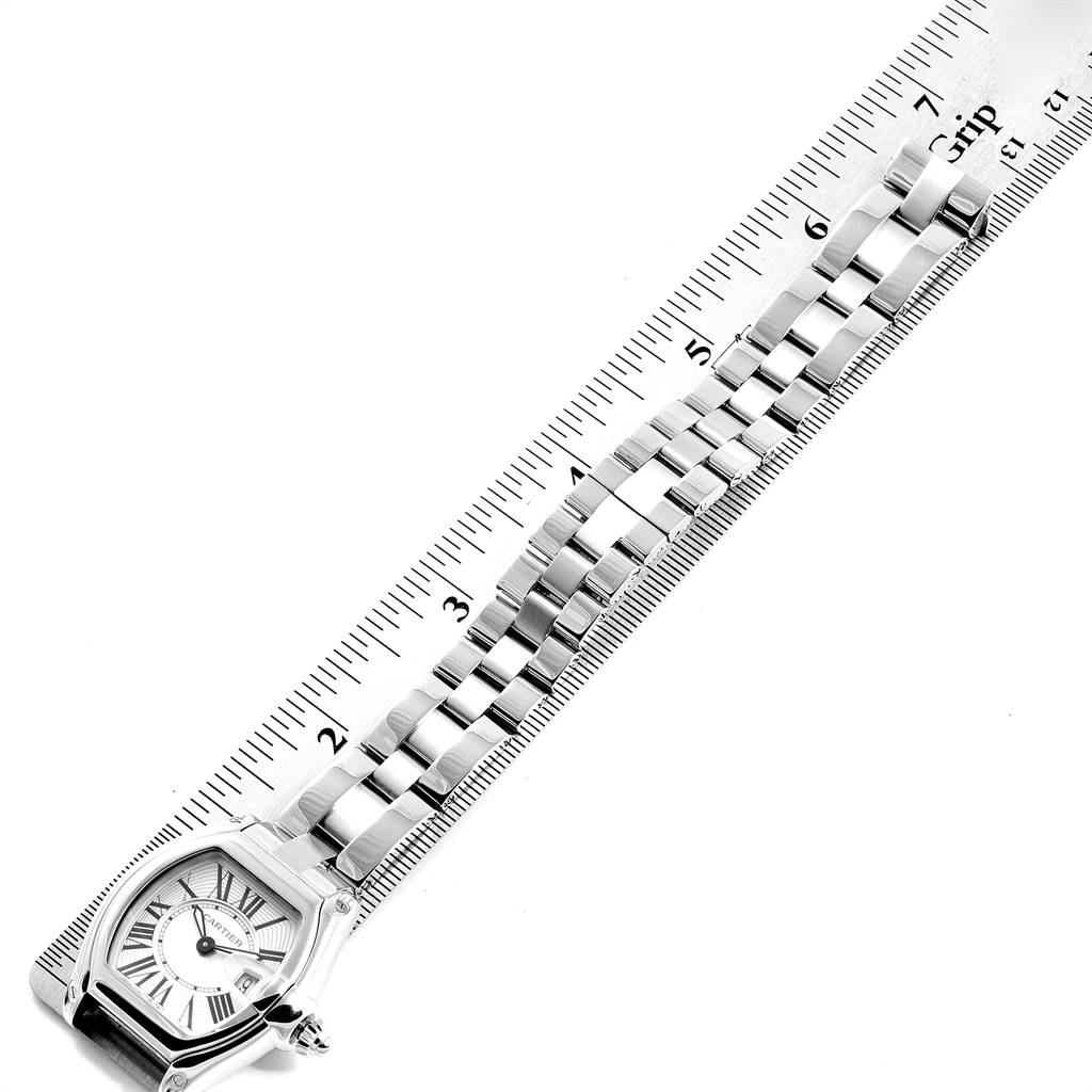 The image shows a Cartier Roadster W62016V3 Women's Stainless Steel Silver Dial W62016V3 Women's Stainless Steel Silver Dial watch face and bracelet band, measured alongside a ruler.
