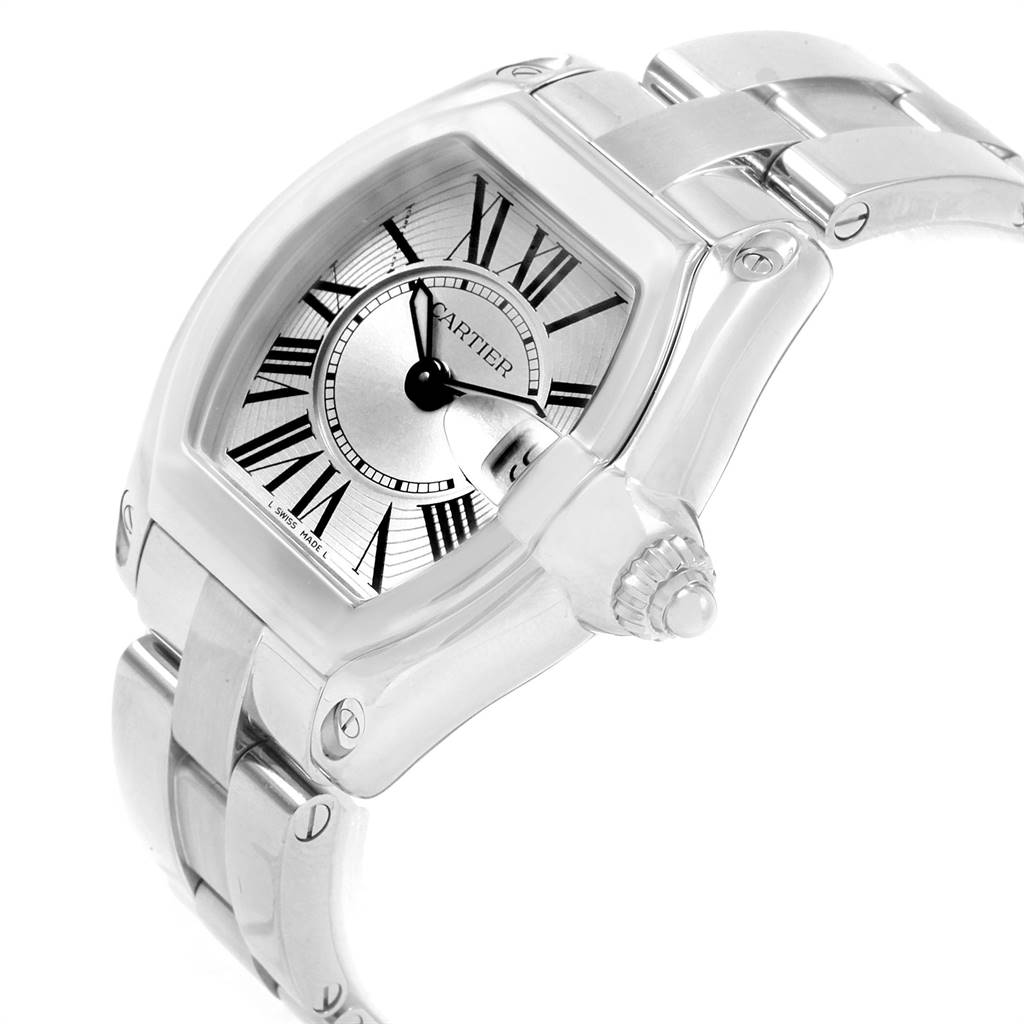This image shows a Cartier Roadster W62016V3 Women's Stainless Steel Silver Dial W62016V3 Women's Stainless Steel Silver Dial watch from an angled view, highlighting its face, bezel, and part of the bracelet.