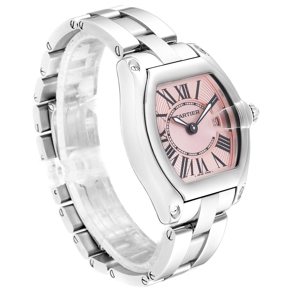 The Cartier Roadster W62017V3 Women's Stainless Steel Pink Dial W62017V3 Women's Stainless Steel Pink Dial watch is shown at an angled frontal view, displaying its pink dial and silver bracelet.